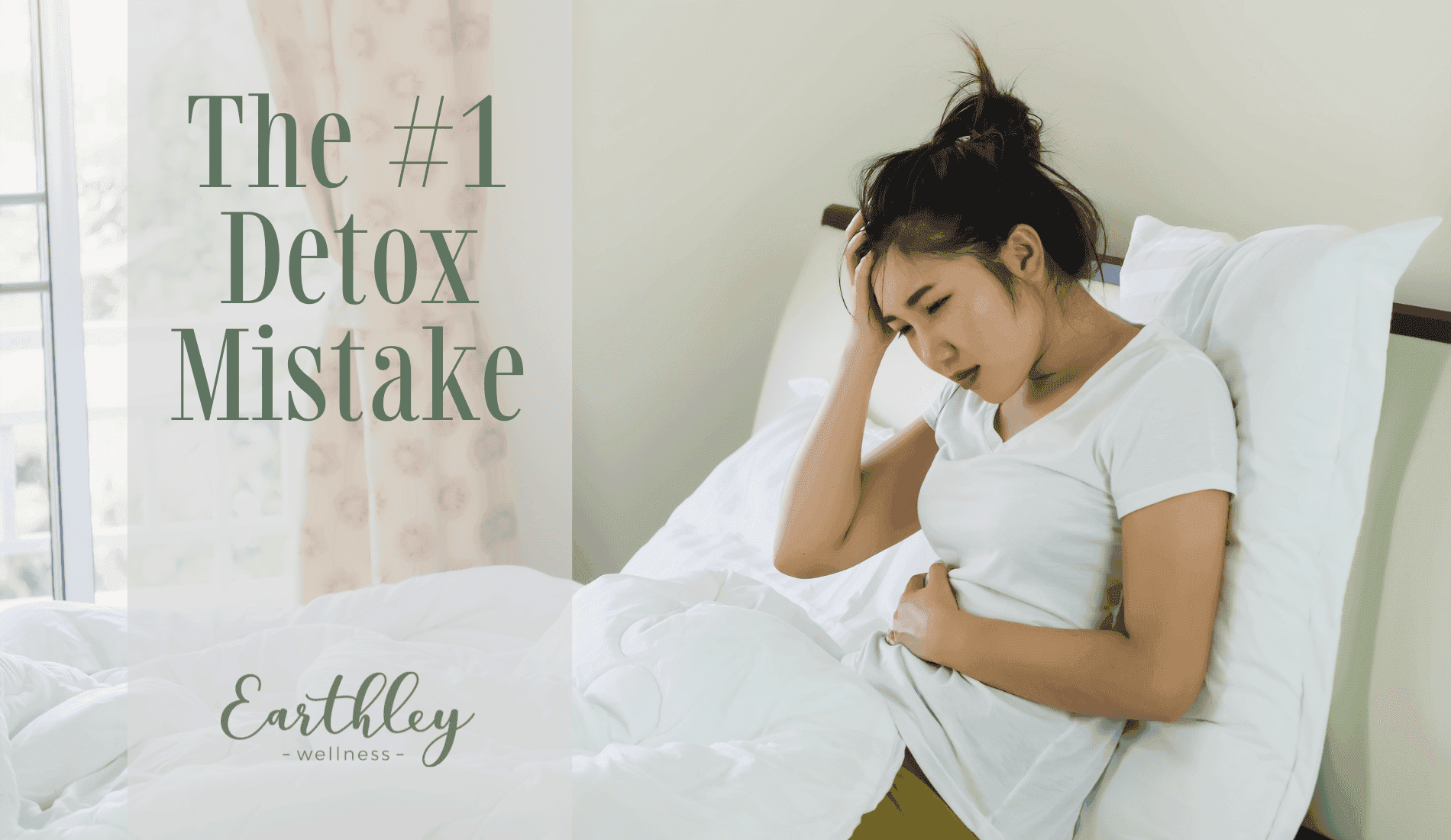 The Number 1 Detox Mistake blog featuring woman with brown hair in white shirt sitting on white bed looking unwell against sage green curtain background