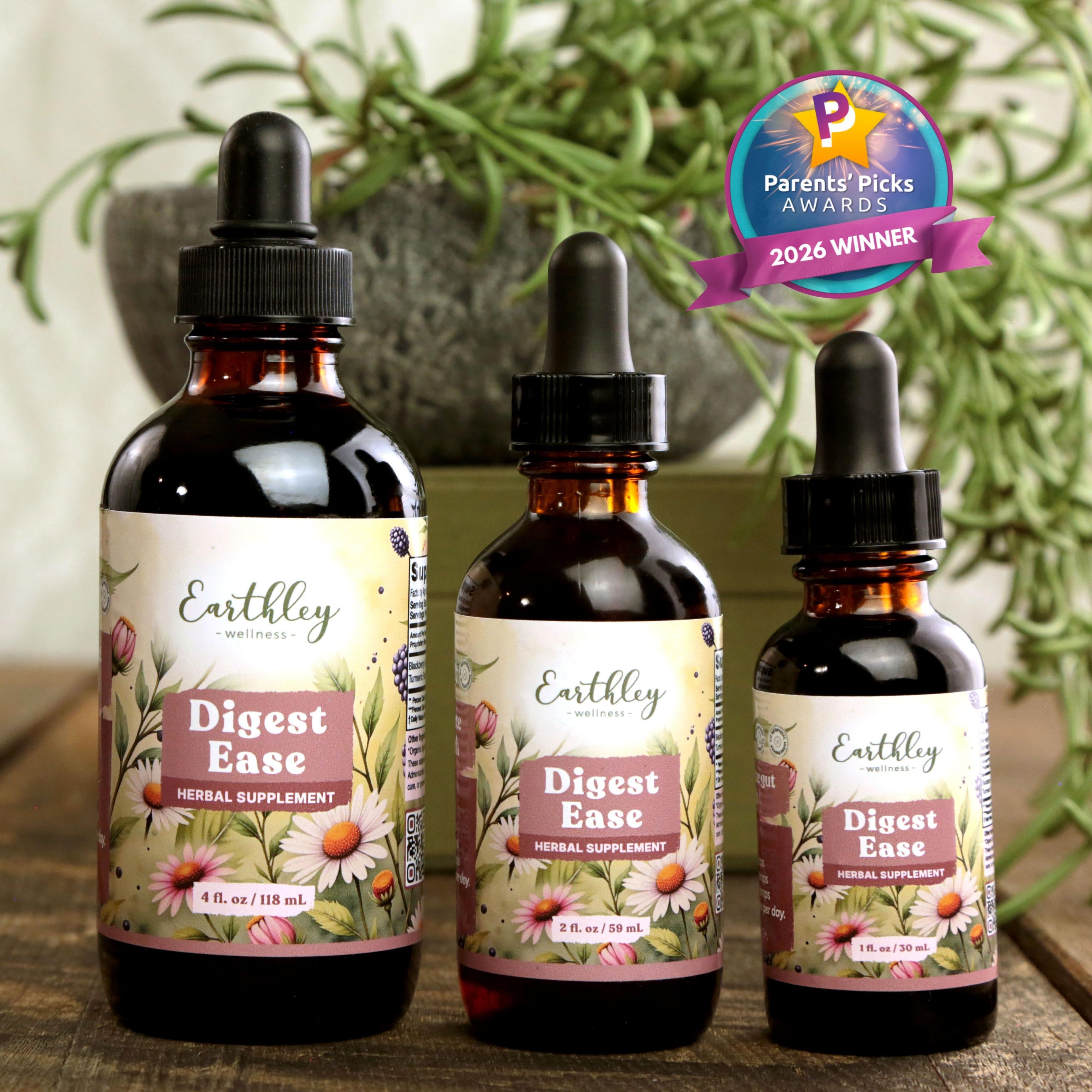 Three amber glass bottles of Earthley Digest Ease herbal supplement tinctures in different sizes with dropper caps, featuring floral labels and Par...
