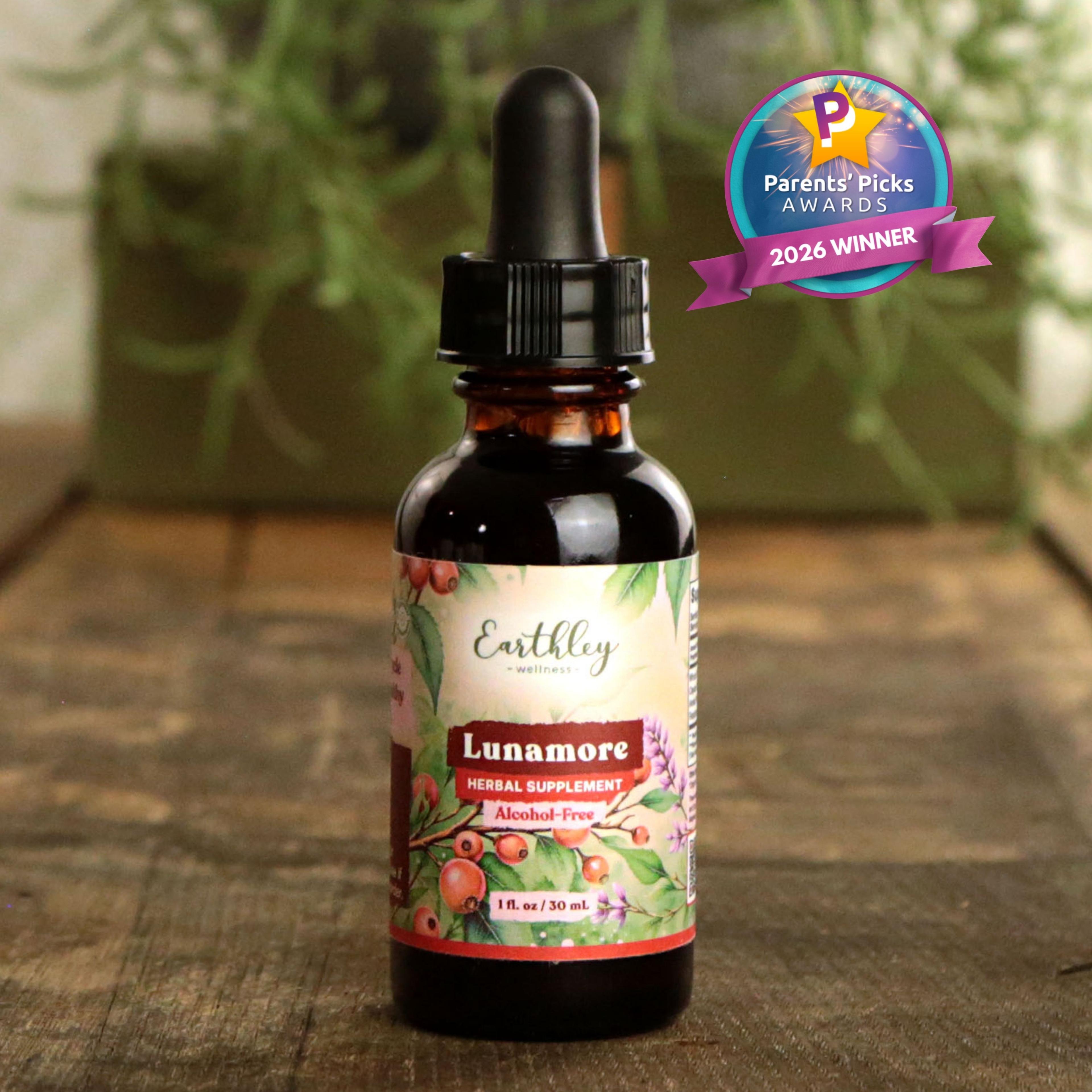 Earthley Wellness Lunamore herbal supplement bottle with dropper, featuring floral label design and Parents' Picks 2026 Winner award badge