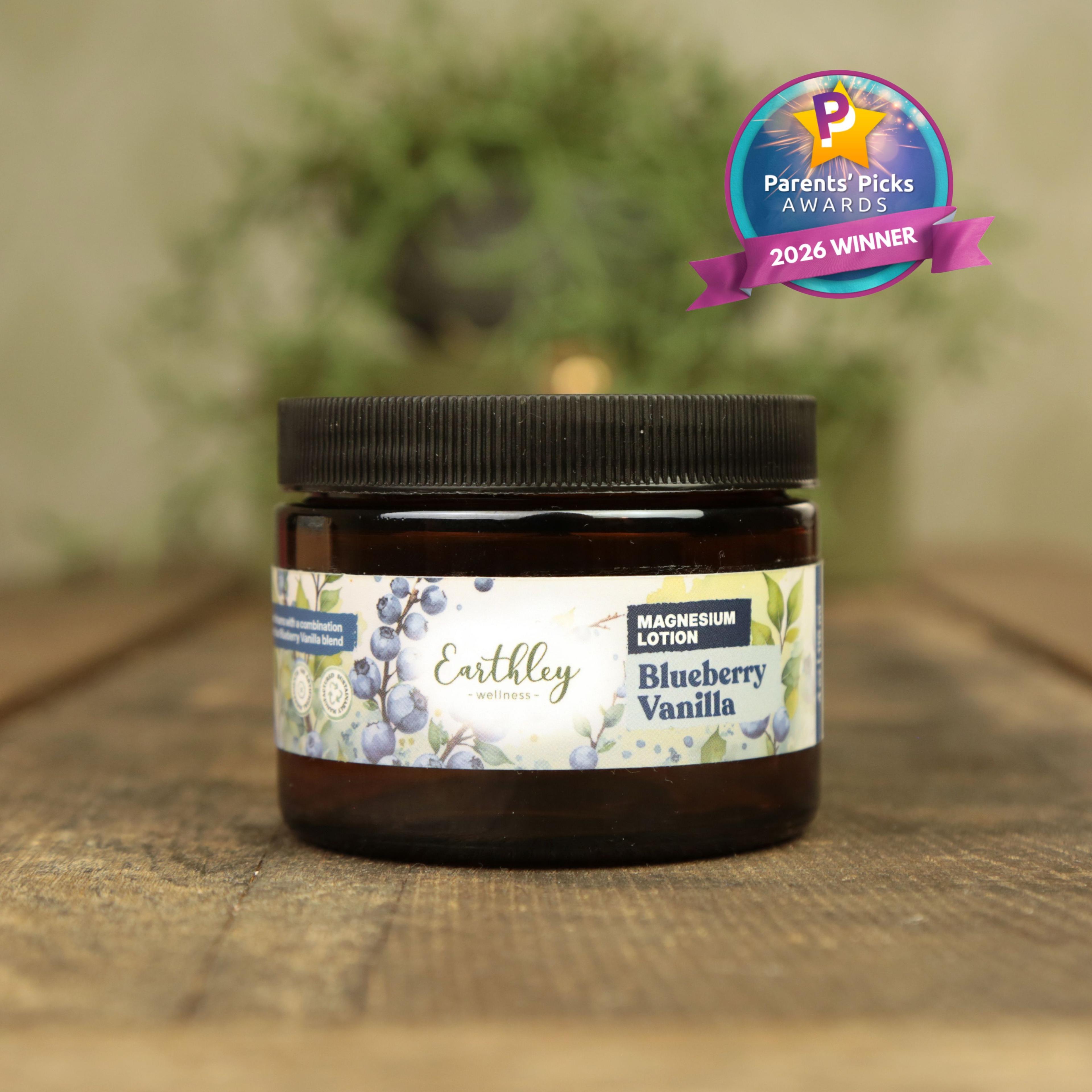 Earthley Blueberry Vanilla Magnesium Lotion jar with Parents' Picks Awards 2026 Winner badge on wooden surface