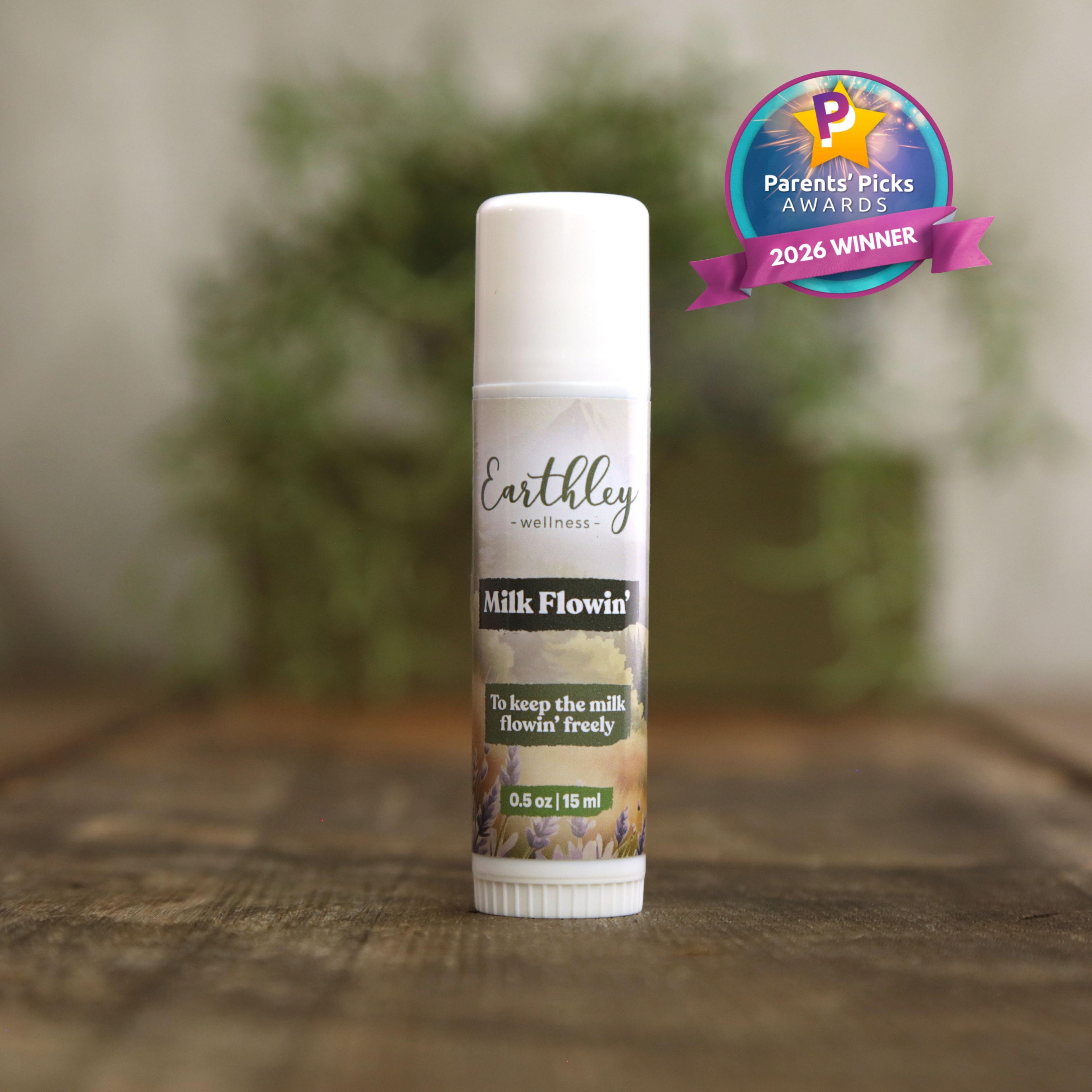 Earthley Wellness Milk Flowin' herbal tincture bottle with Parents' Picks Awards 2026 Winner badge on wooden surface
