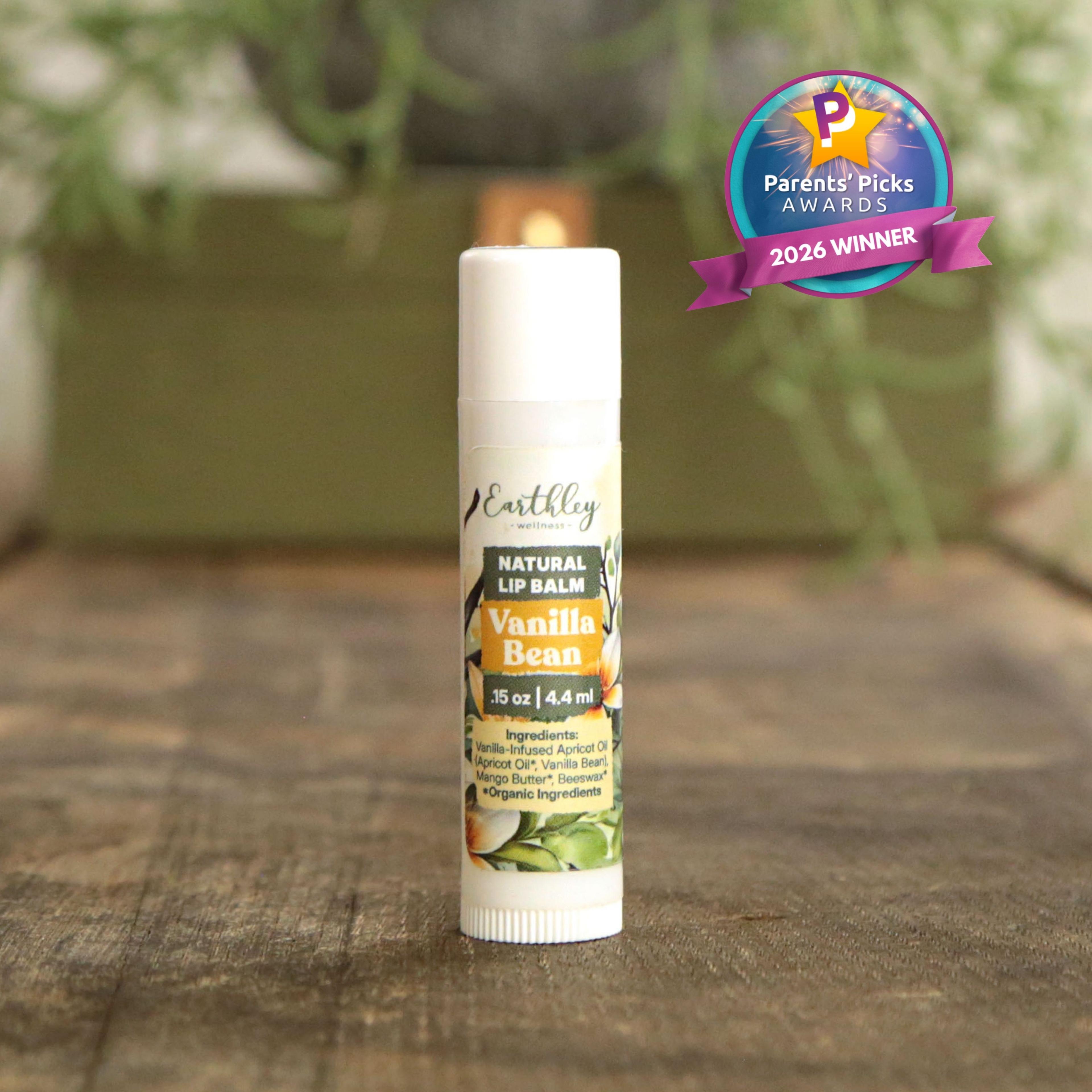 Earthley Vanilla Bean Natural Lip Balm tube on wooden surface with Parents' Picks Awards 2026 Winner badge