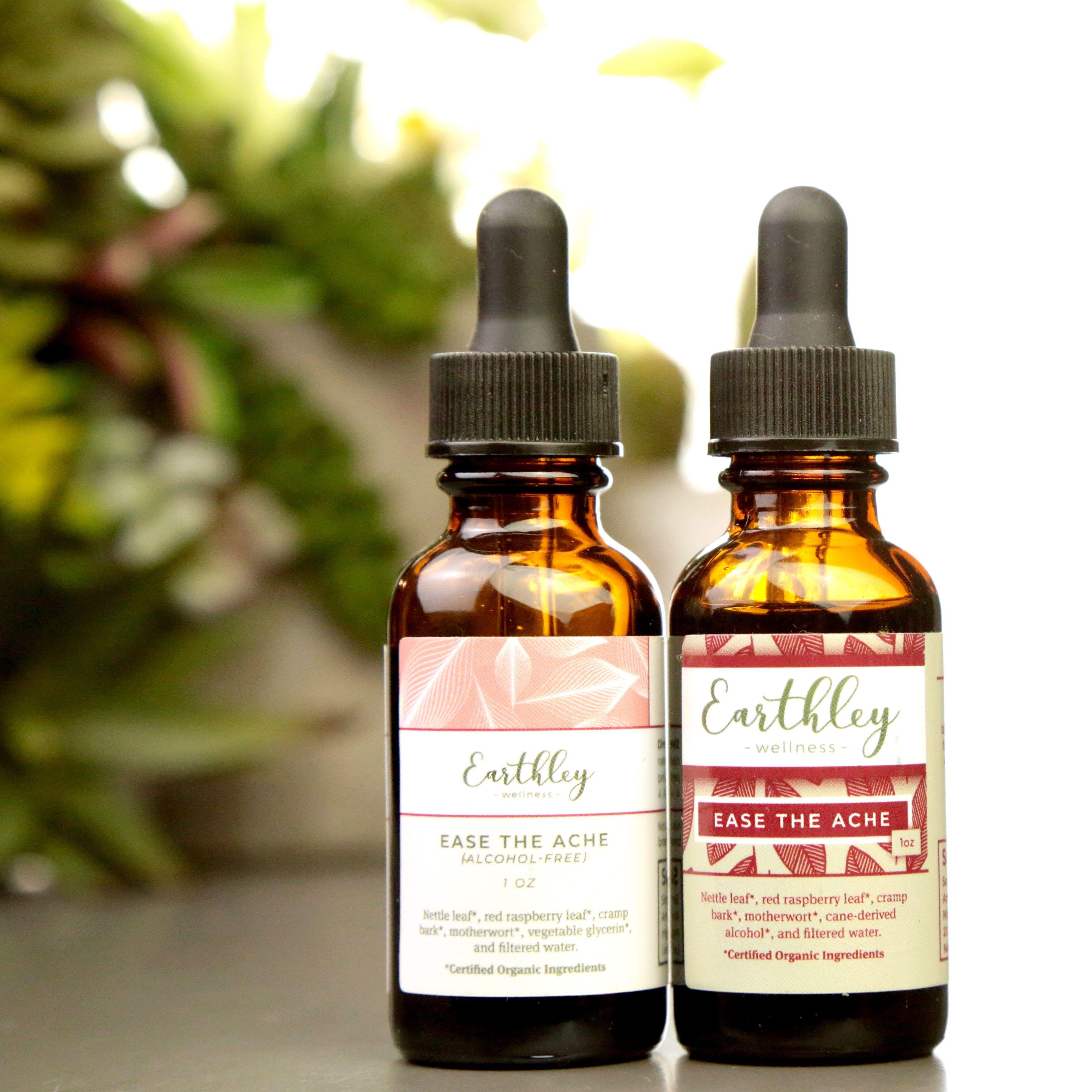 Earthley Ease the Ache womens cramp formula amber dropper bottle with pink geometric label for menstrual comfort support