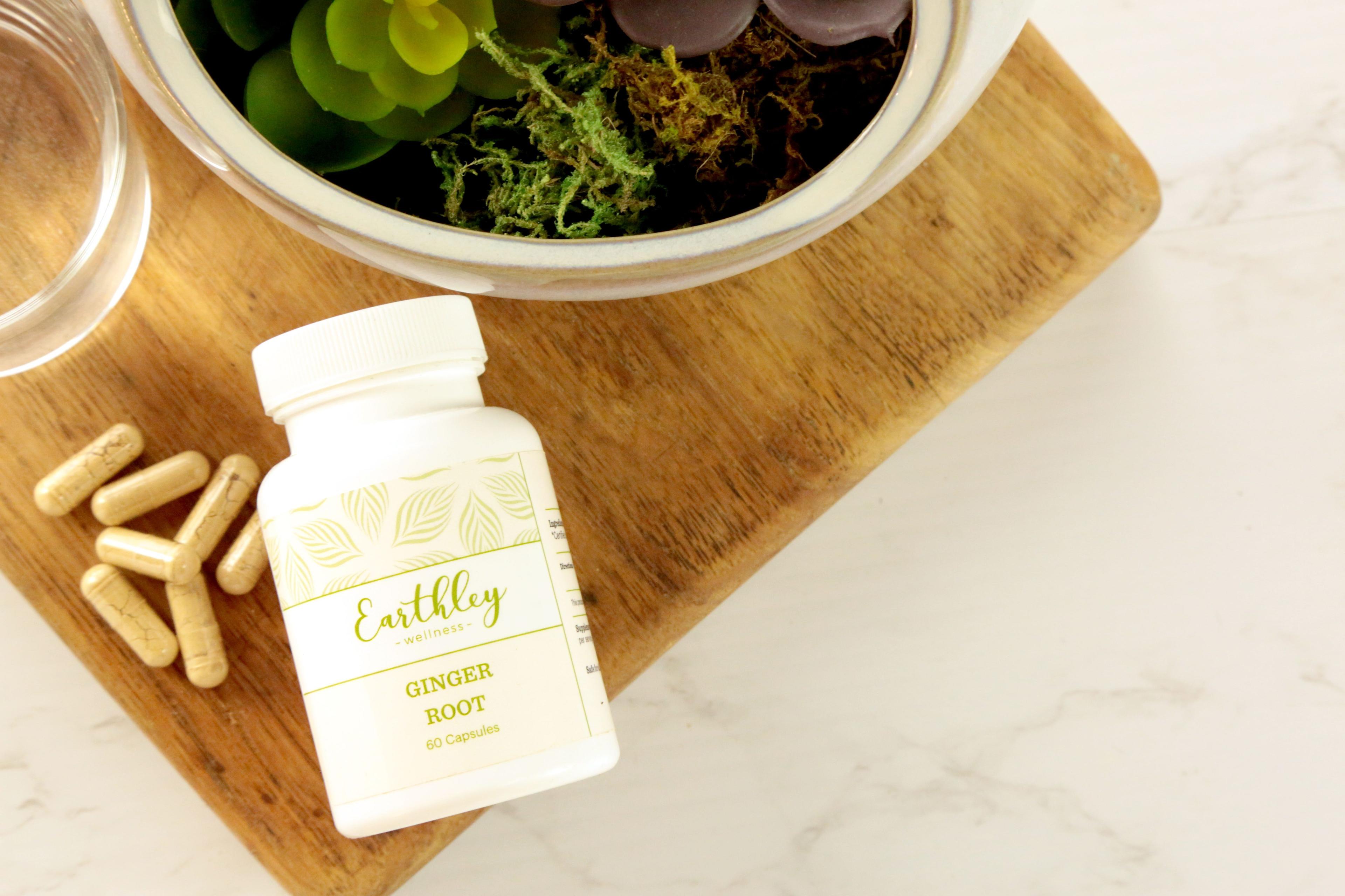 Earthley Ginger Root Capsules product photo showing herbal supplement bottle for stomach comfort